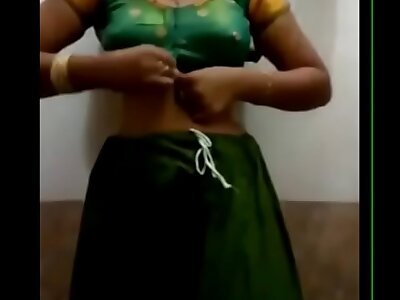 VID-20140201-PV0001-Sivakasi (IT) Tamil 20 yrs old unmarried beautiful, super hot plus X-rated ungentlemanly Ms. Nandhini S. B.Sc., Chemistry, Second year undressing her saree in her home explore attending a af