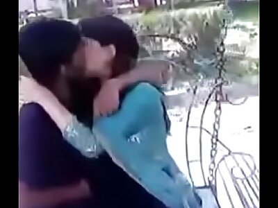 Indian teenage kissing and pressing hooters in public
